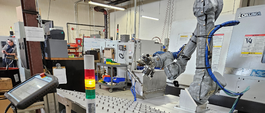 A robot operating machinery in a factory setting.
